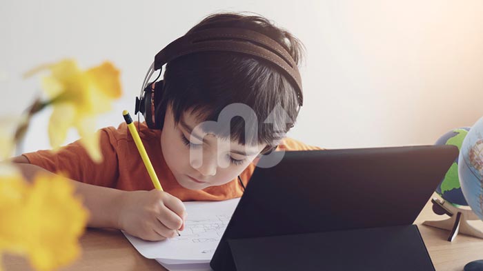 Isolated kid trying distance learning